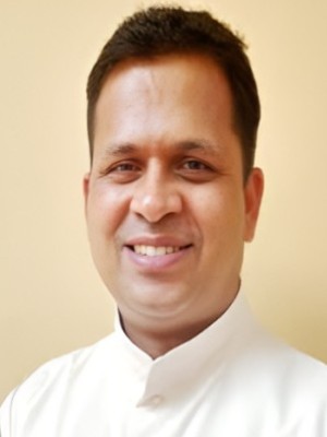 Fr. Dr. Gimmi Akkatt  CST